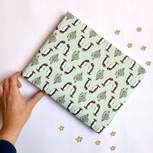 Load image into Gallery viewer, Kissing Penguin Christmas Wrapping Paper
